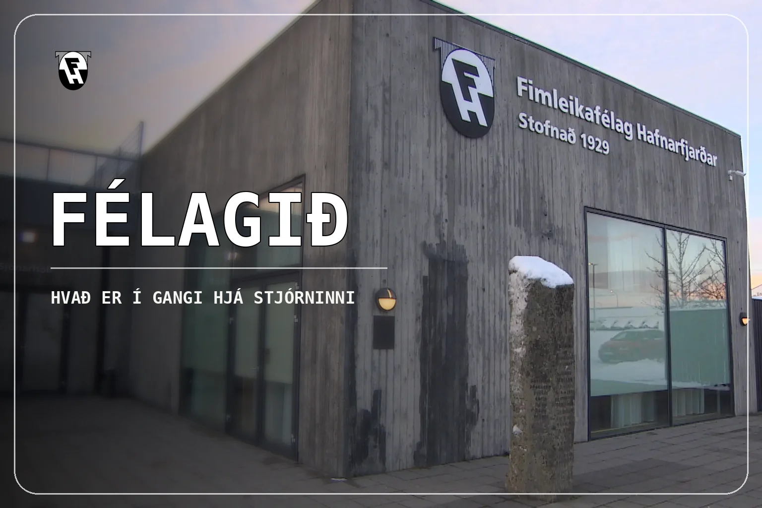Kaplakriki á sumardegi með handboltahúsi og frjálsíþróttasvæði í forgrunni.